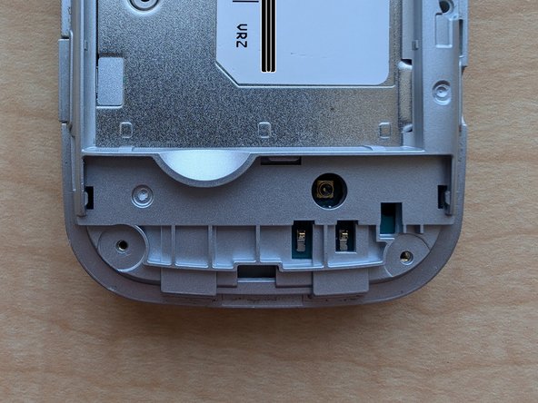 LG Extravert 2 Teardown, Remove the black plate: crwdns2935265:04crwdnd2935265:02crwdnd2935265:02crwdne2935265:0
