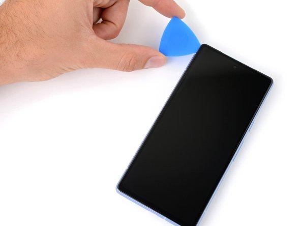 Google Pixel 7a Screen Replacement, Separate the left edge adhesive: crwdns2935265:08crwdnd2935265:02crwdnd2935265:02crwdne2935265:0