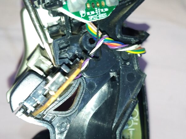Saitek ST90 PS22 Disassembly Guide, Remove the large buttons.: step 5, image 2 of 3