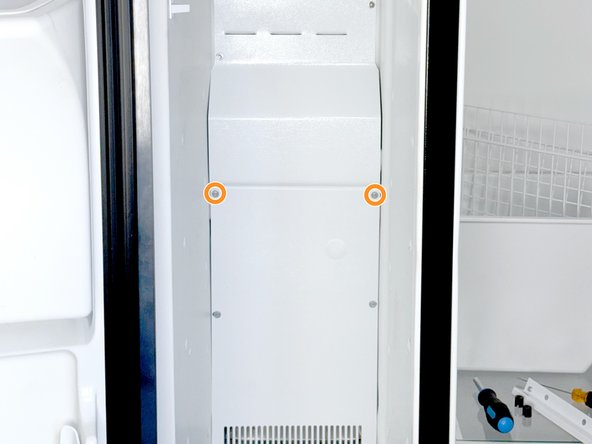 Frigidaire Side-By-Side Refrigerator Evaporator Fan Cover Removal, Unfasten the upper evaporator cover.: crwdns2935265:013crwdnd2935265:02crwdnd2935265:02crwdne2935265:0