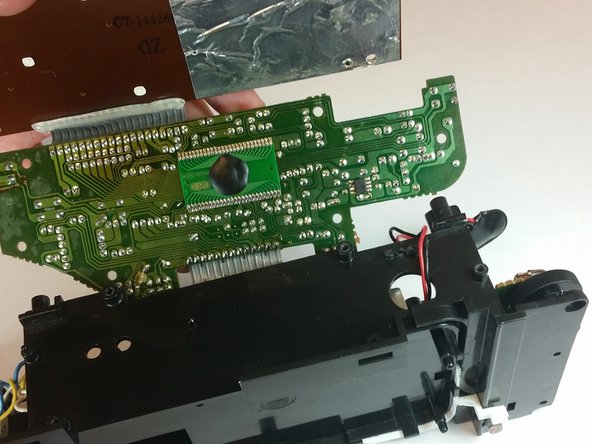 RCA RP3715A Motherboard Replacement, Lift the top piece of motherboard: crwdns2935265:016crwdnd2935265:02crwdnd2935265:03crwdne2935265:0