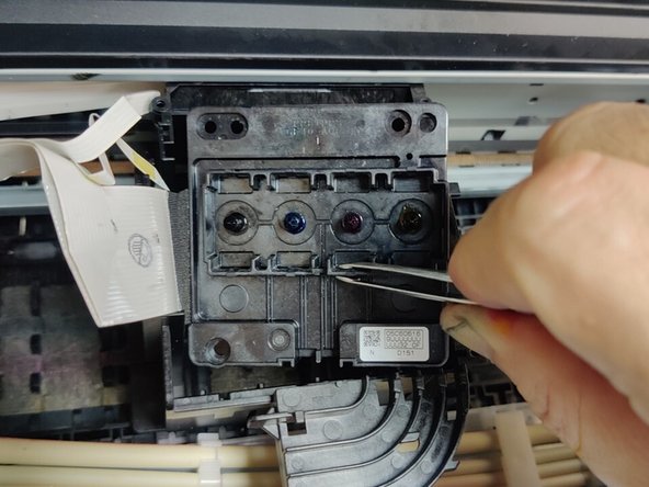 Epson Printer L6170: Accessing Print Head, Error Code 031006, Removing the print head: crwdns2935265:06crwdnd2935265:02crwdnd2935265:03crwdne2935265:0