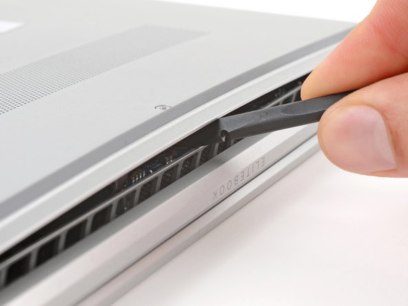 HP EliteBook 845 G8 SSD Replacement, Release the bottom cover clips: crwdns2935265:03crwdnd2935265:03crwdnd2935265:03crwdne2935265:0