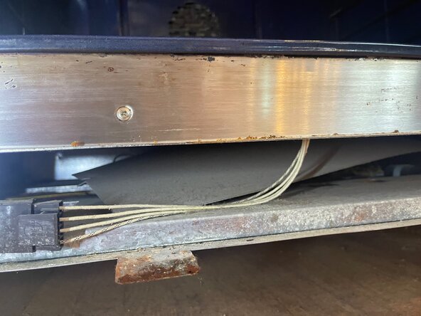 GE Monogram Dual Fuel Range Model ZDP486NDP4SS Hidden Bake Element Replacement, Disconnect Baking Element: step 4, image 1 of 2
