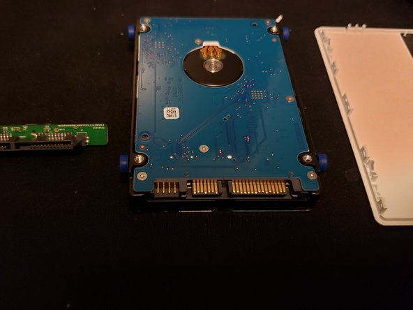 Game Drive for Xbox Teardown, Remove the USB Adapter: crwdns2935265:04crwdnd2935265:02crwdnd2935265:02crwdne2935265:0