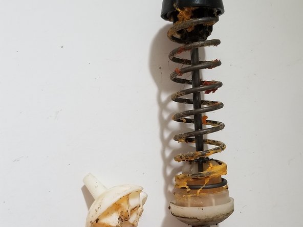 Whirlpool WTW4800XQ2 Suspension Spring Replacement: crwdns2935265:09crwdnd2935265:03crwdnd2935265:03crwdne2935265:0