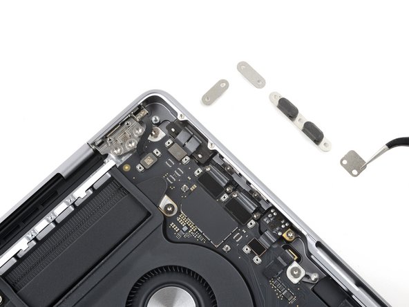 MacBook Pro 14" Late 2023 (M3) USB-C Ports Replacement, Remove the right-side connector covers: crwdns2935265:027crwdnd2935265:03crwdnd2935265:03crwdne2935265:0