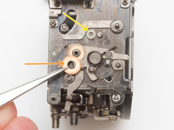 Pentax Super Program Mirror Box Mechanism Service, Remove mirror flip-up lever: crwdns2935265:032crwdnd2935265:02crwdnd2935265:02crwdne2935265:0