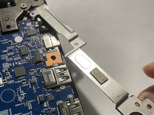 Lenovo ThinkPad L390 Motherboard Replacement, Removing Side Pieces: crwdns2935265:07crwdnd2935265:03crwdnd2935265:03crwdne2935265:0