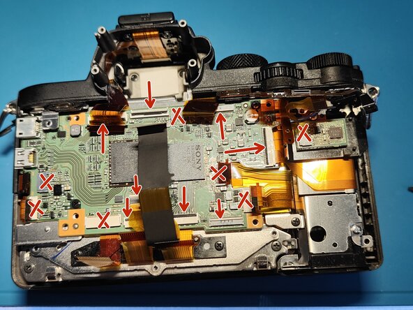 Sony A7 II Top Flex Cable replacement, Removing the motherboard / EVF (check notes): crwdns2935265:019crwdnd2935265:03crwdnd2935265:03crwdne2935265:0