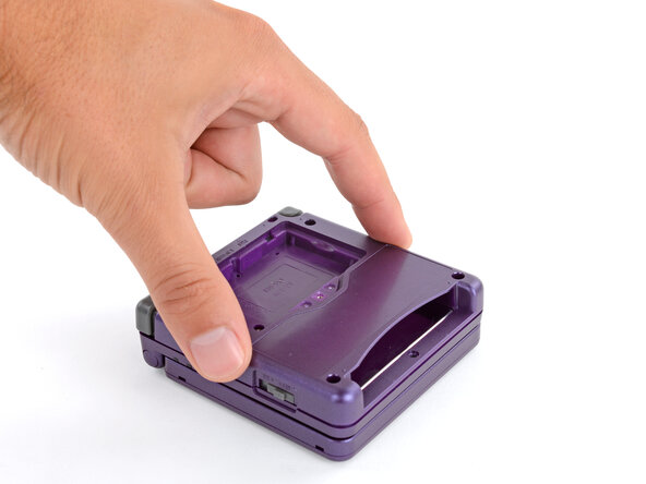 How to Reshell Your Game Boy Advance SP, Put the bottom shell on: crwdns2935265:064crwdnd2935265:02crwdnd2935265:02crwdne2935265:0