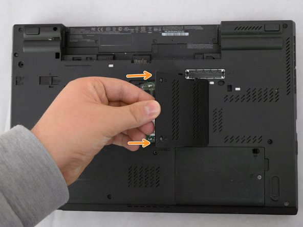Lenovo ThinkPad T530 Memory Module: Bottom Slot Replacement, Remove Rear Memory Cover: crwdns2935265:05crwdnd2935265:03crwdnd2935265:03crwdne2935265:0
