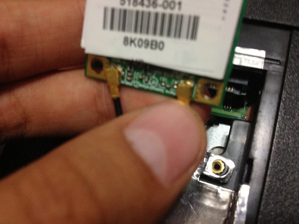 HP G60 Wi-Fi Card Replacement, Reassemble Wi-Fi card: crwdns2935265:05crwdnd2935265:02crwdnd2935265:02crwdne2935265:0