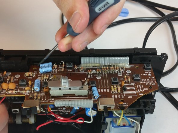 RCA RP3715A Motherboard Replacement, Unlatch release tabs: crwdns2935265:09crwdnd2935265:03crwdnd2935265:03crwdne2935265:0