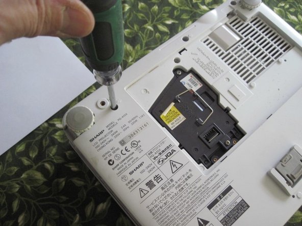 Sharp PG-A10X Thermal Fuse Replacement, Replace the case screws: crwdns2935265:016crwdnd2935265:02crwdnd2935265:03crwdne2935265:0