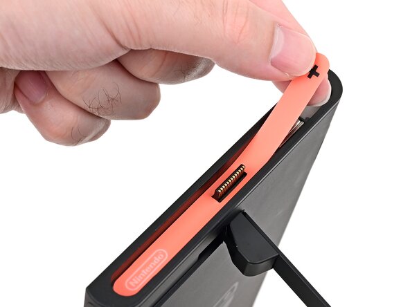 Nintendo Switch 2 Microphone Replacement, Remove the right side sticker: crwdns2935265:08crwdnd2935265:01crwdnd2935265:03crwdne2935265:0