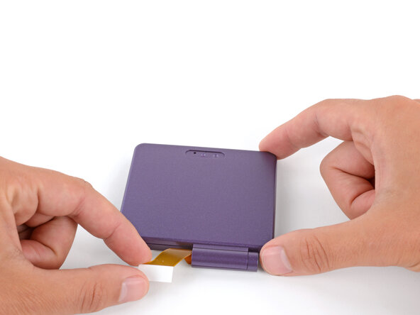 How to Reshell Your Game Boy Advance SP, Install the exterior shell: crwdns2935265:038crwdnd2935265:02crwdnd2935265:02crwdne2935265:0