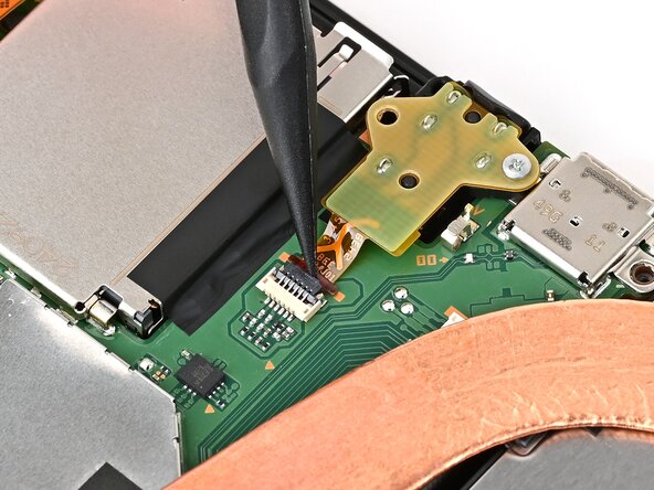 Nintendo Switch 2 Headphone Jack Replacement, Remove the headphone jack: crwdns2935265:035crwdnd2935265:01crwdnd2935265:02crwdne2935265:0