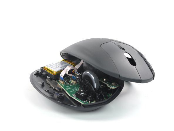 How to Open the Logitech MX Ergo, Reposition the top half: crwdns2935265:09crwdnd2935265:03crwdnd2935265:03crwdne2935265:0