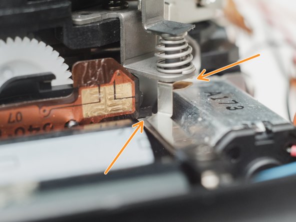 Mirror Box Removal, Remove lens release switch: crwdns2935265:023crwdnd2935265:02crwdnd2935265:02crwdne2935265:0