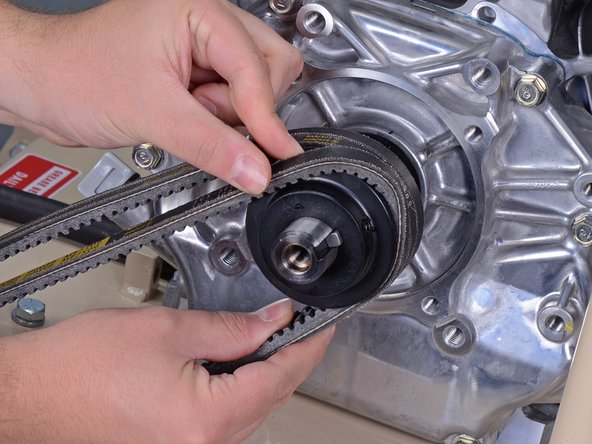 EDCO PRO KL-18 Concrete Saw Belts Replacement, Remove the belts from the motor pulley: crwdns2935265:014crwdnd2935265:02crwdnd2935265:03crwdne2935265:0