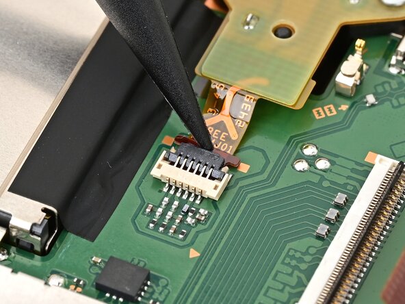 Nintendo Switch 2 Board Replacement, Disconnect the headphone jack: crwdns2935265:046crwdnd2935265:01crwdnd2935265:02crwdne2935265:0