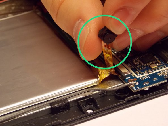 Datawind Ubislate 7ci Rear Facing Camera Replacement, Removing the tape around the camera: crwdns2935265:03crwdnd2935265:02crwdnd2935265:02crwdne2935265:0
