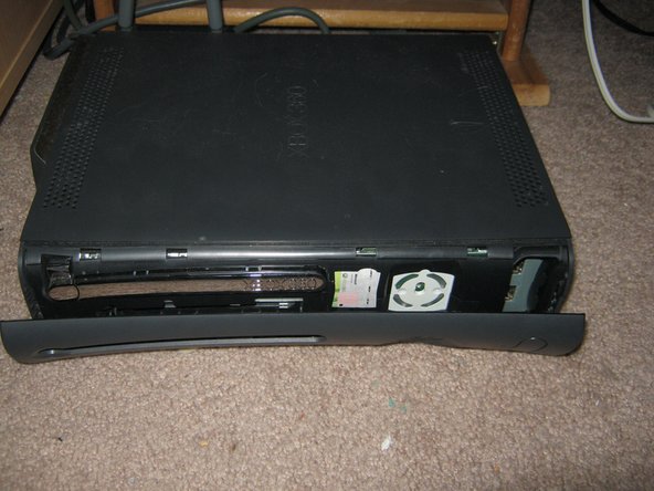 OBSOLETE - How to Remove a stuck game from an Xbox 360, Replace the faceplate: crwdns2935265:03crwdnd2935265:02crwdnd2935265:03crwdne2935265:0