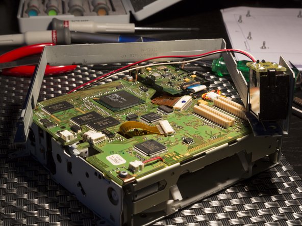 Disassembling Audi Navigation Plus unit: step 8, image 3 of 3