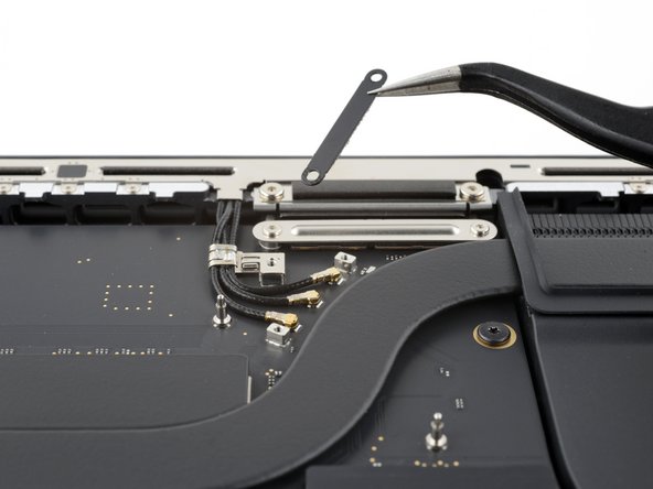 MacBook Pro 14" Late 2023 (M3) USB-C Ports Replacement, Unfasten the antenna cables: crwdns2935265:022crwdnd2935265:03crwdnd2935265:03crwdne2935265:0