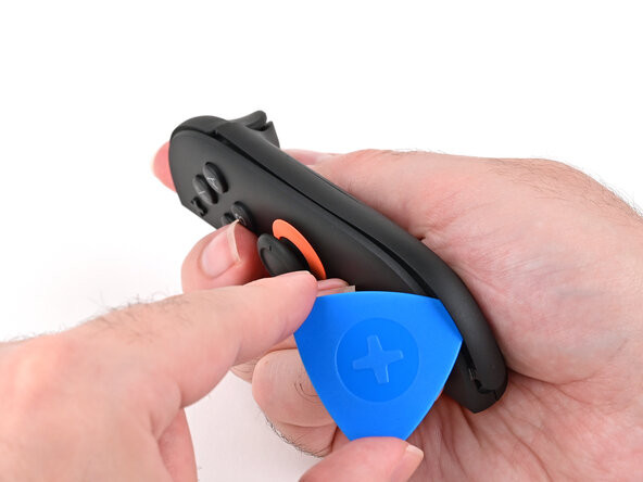 Joy-Con 2 (Right) Joystick Replacement, Remove the plastic strip: crwdns2935265:04crwdnd2935265:02crwdnd2935265:03crwdne2935265:0