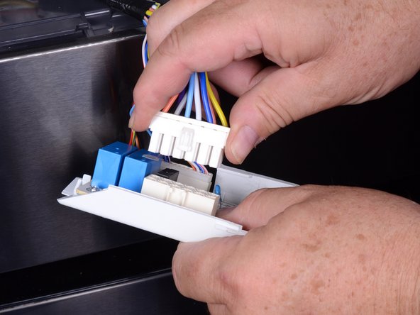 LG Refrigerator LFX25973 Dispenser PC Board Replacement, Disconnect the dispenser PC board: crwdns2935265:014crwdnd2935265:02crwdnd2935265:02crwdne2935265:0