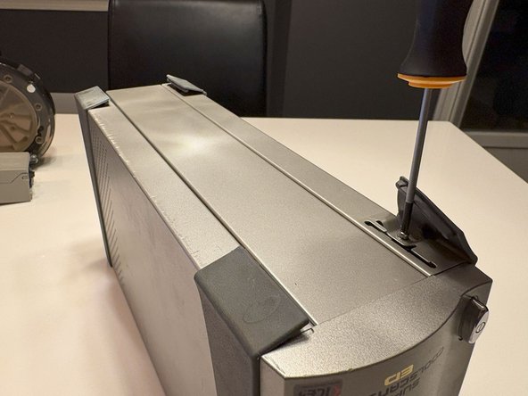 Cleaning the mirror, Remove hidden screws under Rubber pads: crwdns2935265:03crwdnd2935265:02crwdnd2935265:03crwdne2935265:0