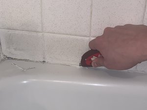 Best way to remove deals caulk from bathtub