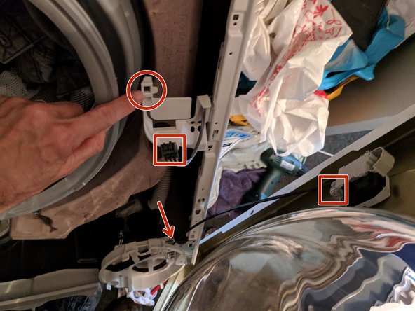 Washing Machine Disassembly to Access Water Drain Pump, Remove front cover: step 10, image 2 of 3