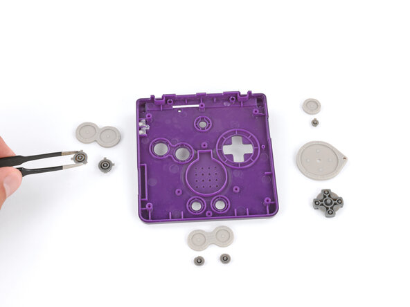 How to Reshell Your Game Boy Advance SP, Remove the buttons: crwdns2935265:042crwdnd2935265:03crwdnd2935265:03crwdne2935265:0