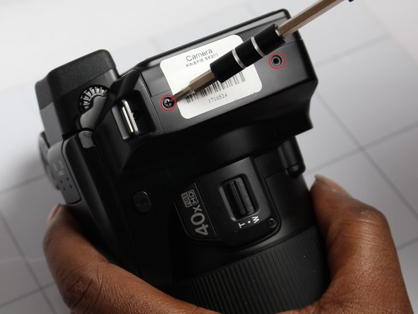 How to check Fujifilm FinePix S8200 for loose LCD connection, Rear Housing Cover: crwdns2935265:04crwdnd2935265:02crwdnd2935265:03crwdne2935265:0