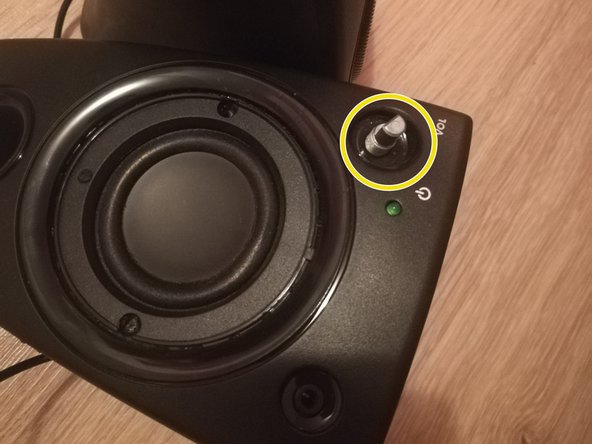 How to open Logitech Z130 speakers, Remove the volume button and its nut: crwdns2935265:04crwdnd2935265:03crwdnd2935265:03crwdne2935265:0