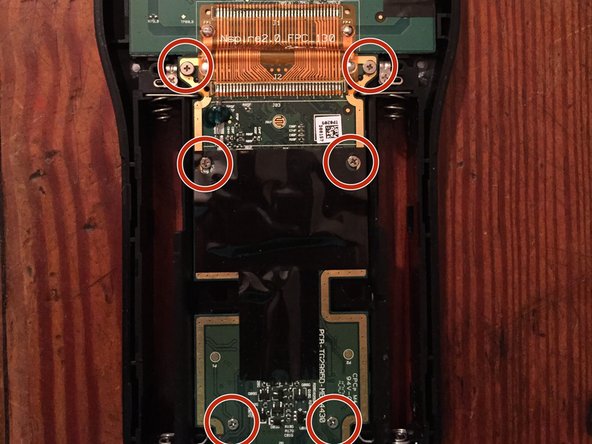 TI-Nspire CAS Teardown, Taking the Screen and Mother Board Out: step 4, image 2 of 3
