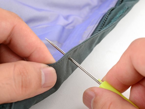 How to Replace a Plastic Snap With a Handheld Tool, Clear the fabric hole: crwdns2935265:03crwdnd2935265:02crwdnd2935265:02crwdne2935265:0