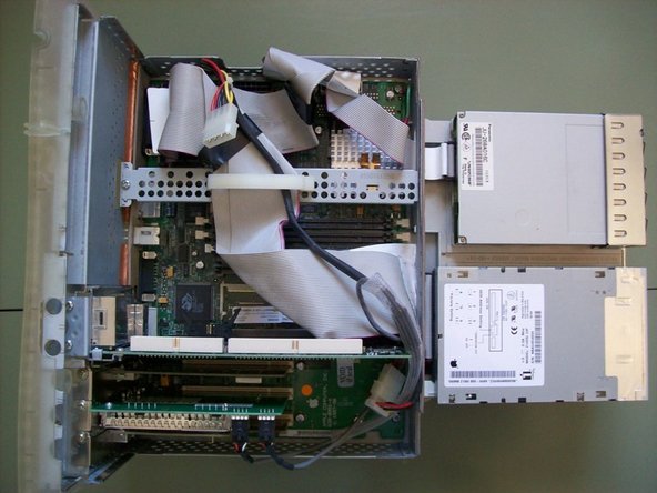 PowerMac G3 All-In-One Teardown, Taking the motherboard tray out of the computer.: step 5, image 3 of 3