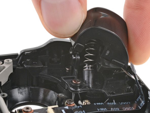 Steam Deck OLED Front Shell Replacement, Remove the left trigger: crwdns2935265:039crwdnd2935265:02crwdnd2935265:03crwdne2935265:0