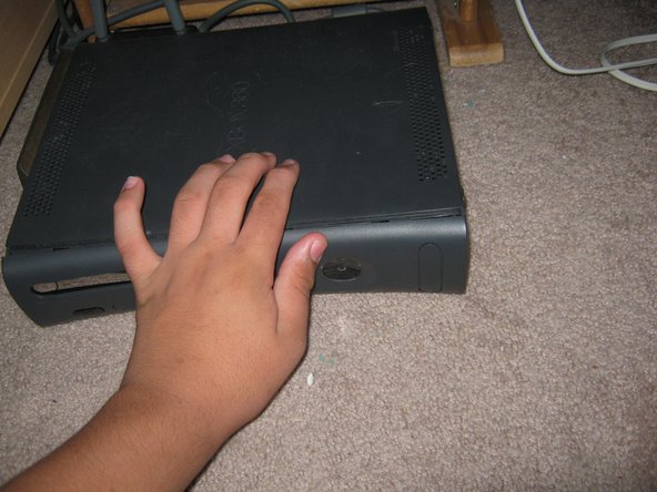 OBSOLETE - How to Remove a stuck game from an Xbox 360, Replace the faceplate: crwdns2935265:03crwdnd2935265:03crwdnd2935265:03crwdne2935265:0