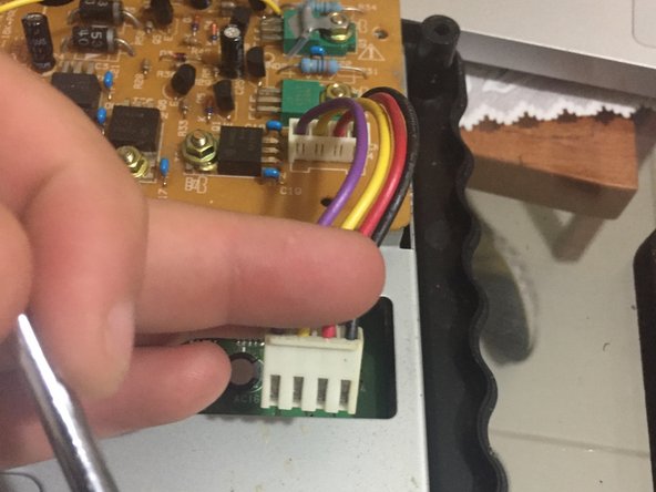 SNK Neo Geo CD Teardown, step 7: crwdns2935265:07crwdnd2935265:02crwdnd2935265:03crwdne2935265:0