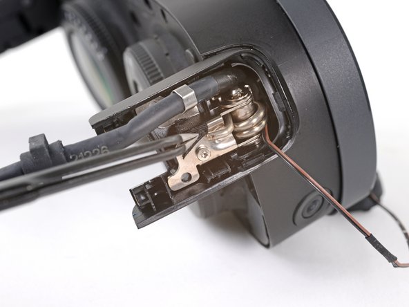 HTC Vive XR Elite Motion Sensor Replacement, Peel the hinge tape: crwdns2935265:015crwdnd2935265:02crwdnd2935265:02crwdne2935265:0