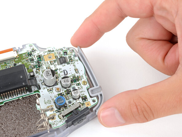 Game Boy Advance Speaker Replacement, Remove the side bumpers: crwdns2935265:07crwdnd2935265:01crwdnd2935265:03crwdne2935265:0