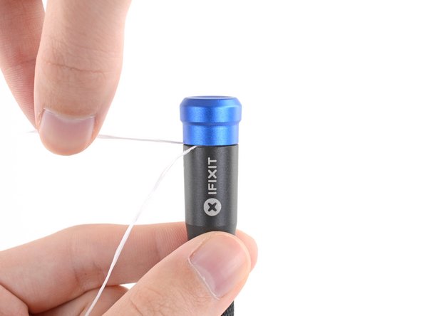 How to Reattach the Cap on a 4 mm iFixit Precision Bit Driver, Remove the floss: crwdns2935265:08crwdnd2935265:03crwdnd2935265:03crwdne2935265:0