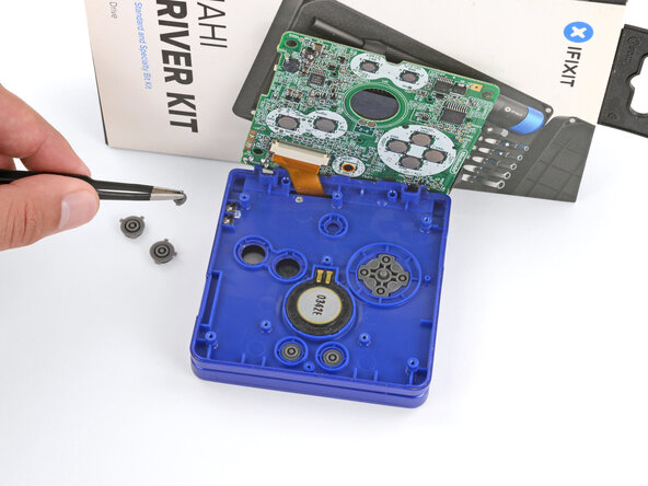 Nintendo Game Boy Advance SP Buttons Replacement, Remove the buttons: crwdns2935265:013crwdnd2935265:02crwdnd2935265:03crwdne2935265:0