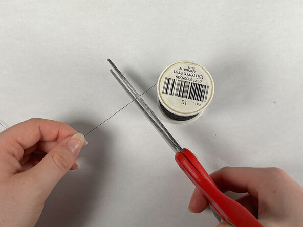 How to Reattach an Umbrella Strap: passo 6, immagine 2 di 2