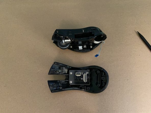 Razer Naga Epic Mouse Initial Disassembly, Disconnect ribbon cables from top panel: crwdns2935265:08crwdnd2935265:03crwdnd2935265:03crwdne2935265:0